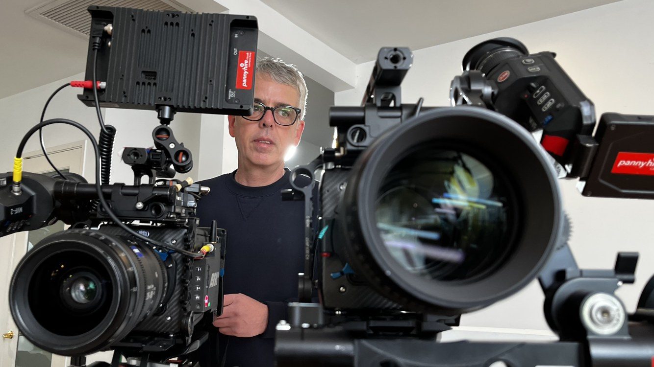 Todd surrounded by professional cinema camera rigs