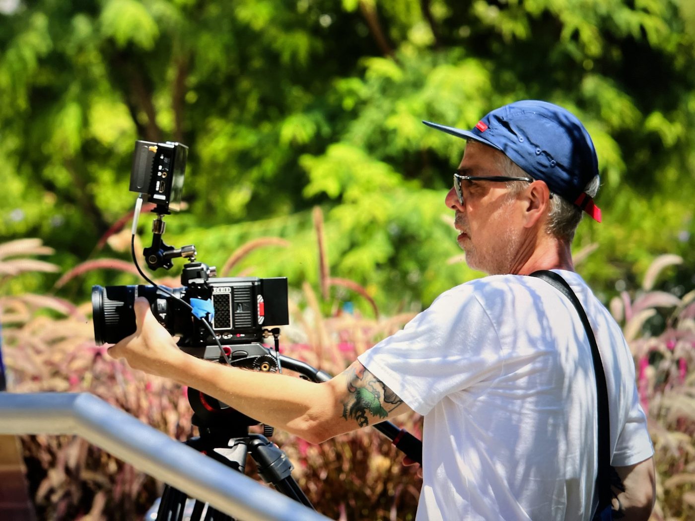 Todd operating a RED cinema camera on an outdoor shoot